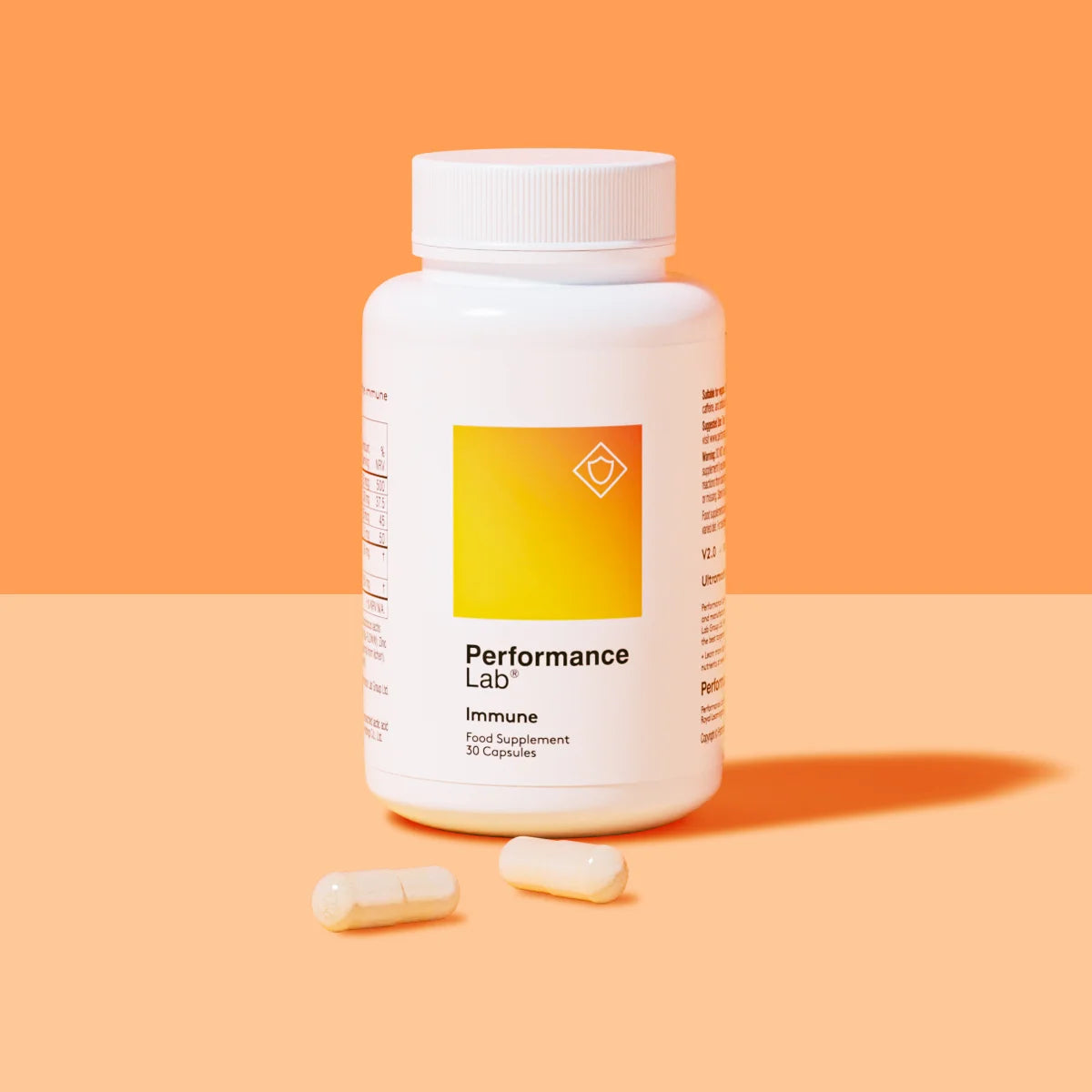 Performance Lab Immune supplement bottle with two capsules.